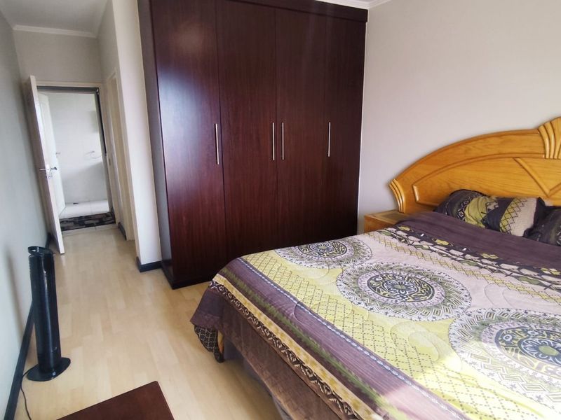 SECURE 2-BEDROOM PET-FRIENDLY APARTMENT WITH MAIN EN-SUITE, COMMUNAL POOL, AND 24-HOUR SECURITY - Photo 6