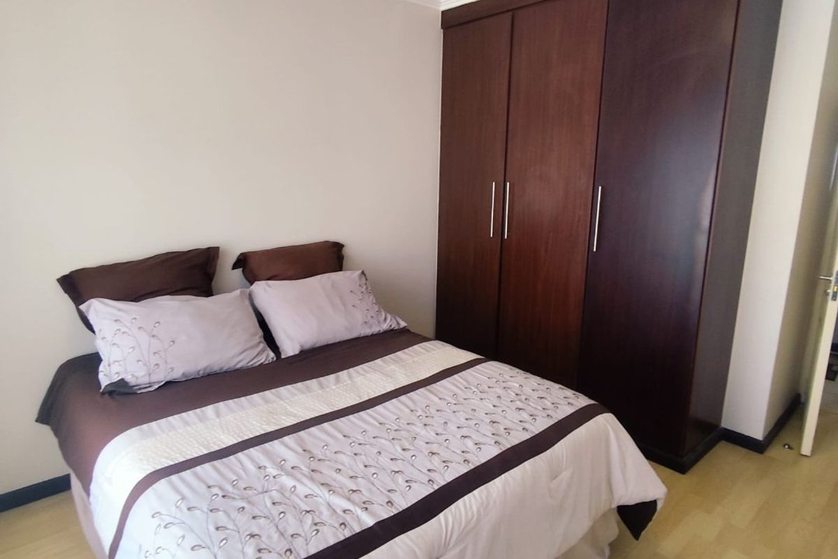 SECURE 2-BEDROOM PET-FRIENDLY APARTMENT WITH MAIN EN-SUITE, COMMUNAL POOL, AND 24-HOUR SECURITY - Photo 4