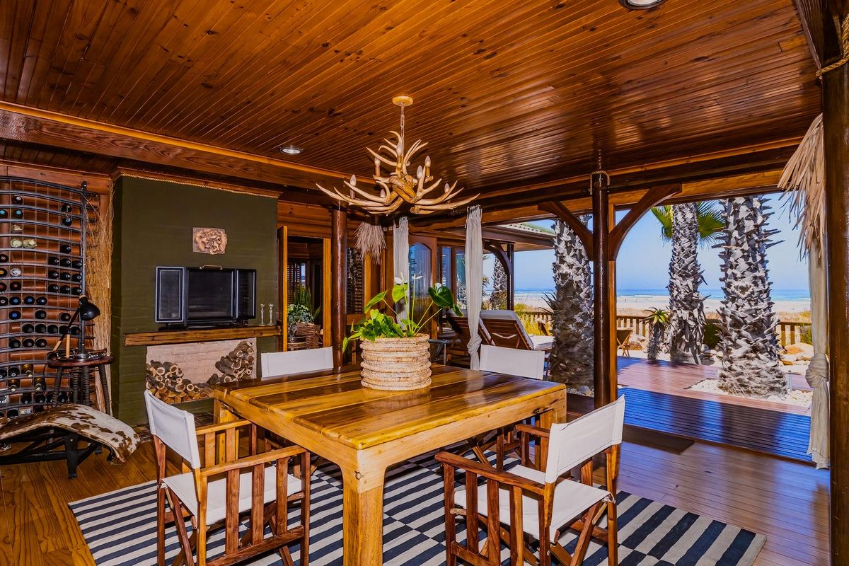 Exceptional Knysna-Style Beachfront Retreat for Coastal Living in Melkbosstrand Central - Photo 4
