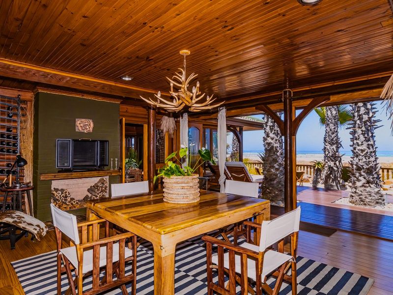 Exceptional Knysna-Style Beachfront Retreat for Coastal Living in Melkbosstrand Central - Photo 4
