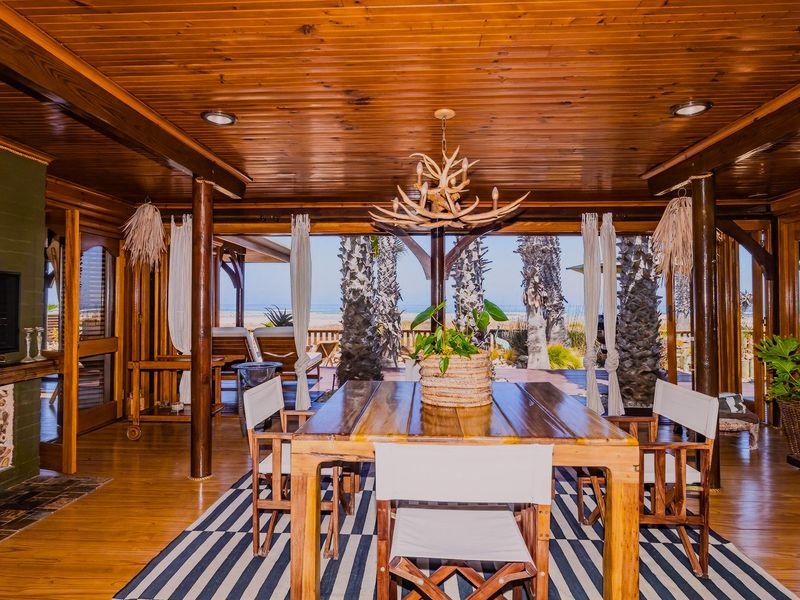 Exceptional Knysna-Style Beachfront Retreat for Coastal Living in Melkbosstrand Central - Photo 6