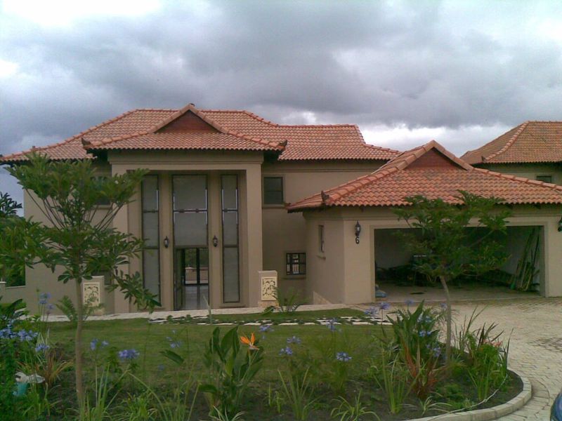 Escape to Coastal Elegance at Southbroom Bali Villas - Photo 1