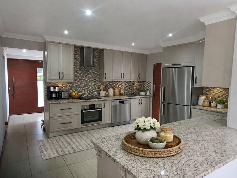 Modern Estate Experience with a Quiet Pastoral Charm and Full-Time Security - Photo 2