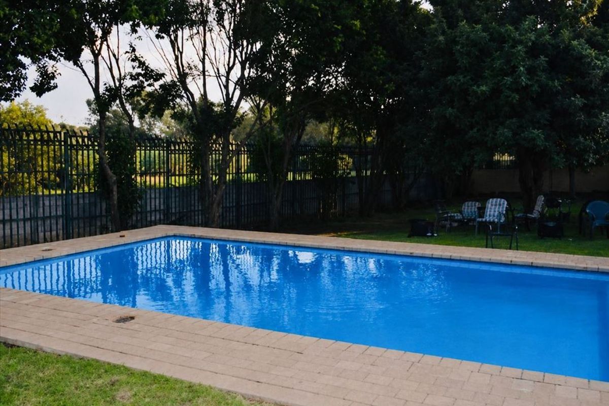 Charming Family Home with Pool and Carport - Photo 3