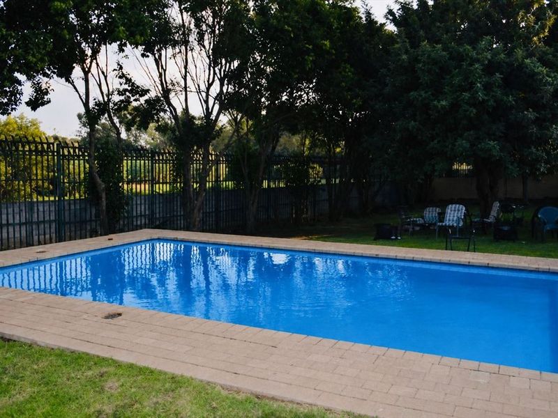 Charming Family Home with Pool and Carport - Photo 3