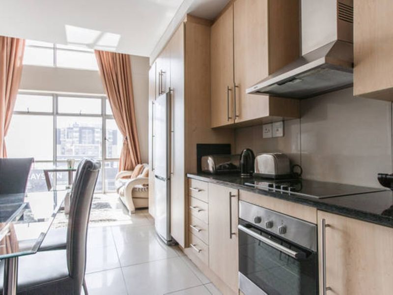 Stunning 3 Bedroom 3 Bath Penthouse in heart of Sandton Fully Furnished What a Steal- Reduced Price! - Photo 4