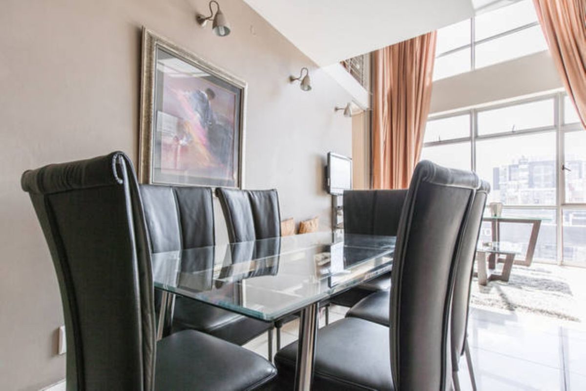 Stunning 3 Bedroom 3 Bath Penthouse in heart of Sandton Fully Furnished What a Steal- Reduced Price! - Photo 5