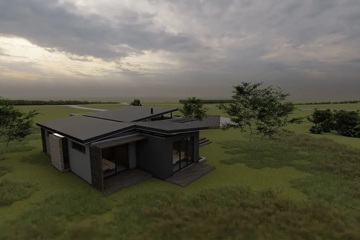 An aerial perspective of a modern architectural home featuring a flat roof, stone accents, and timber decking set in a spacious landscape.