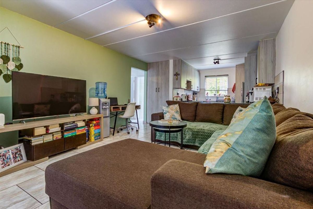 Charming Two-Bedroom Home with Pool and Carport - Photo 2