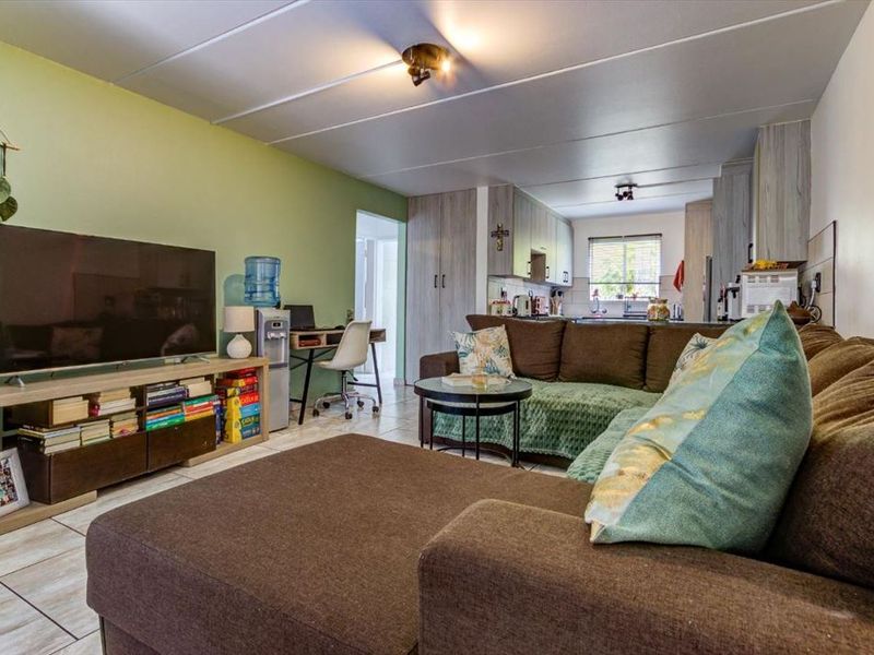 Charming Two-Bedroom Home with Pool and Carport - Photo 2