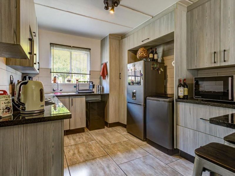 Charming Two-Bedroom Home with Pool and Carport - Photo 1