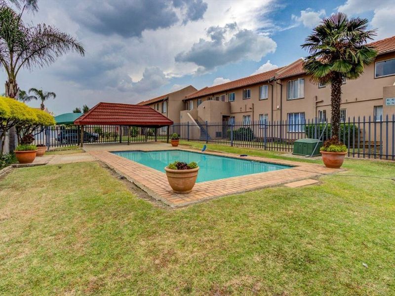 Charming Two-Bedroom Home with Pool and Carport - Photo 3