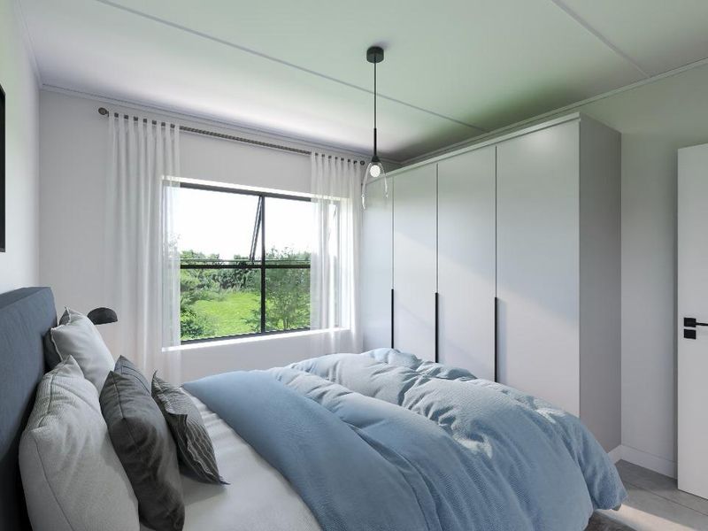 A modern bedroom featuring a built-in wardrobe, a pendant light fixture, and a window with a view of the surrounding greenery.
