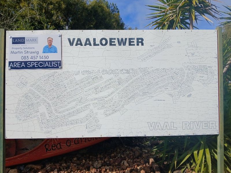 A site map signage board for the Vaaloewer residential area located along the Vaal River.