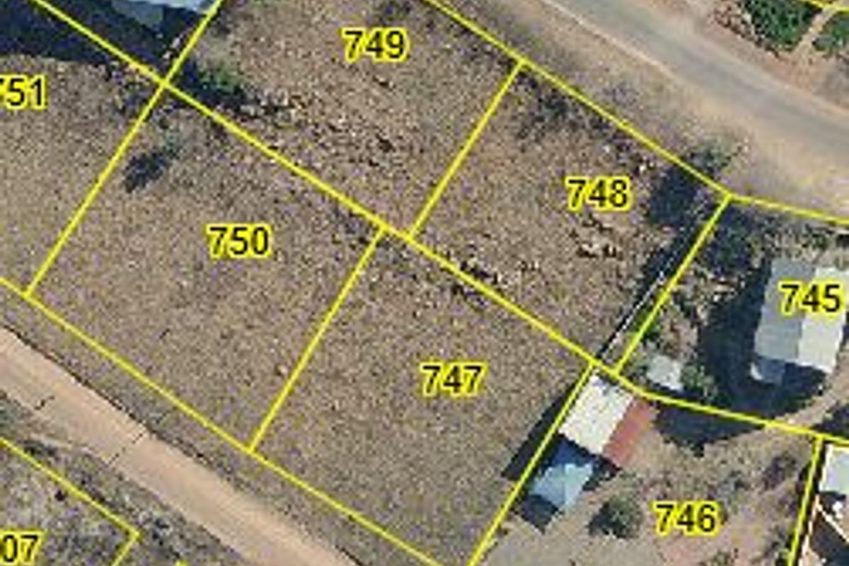 An aerial view showing the cadastral layout and boundary lines for residential vacant land plots in a suburban development.