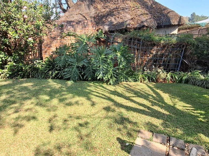 Elegant Queenswood Oasis with 3 Beds and Borehole PLUS granny flat & offices - Photo 1