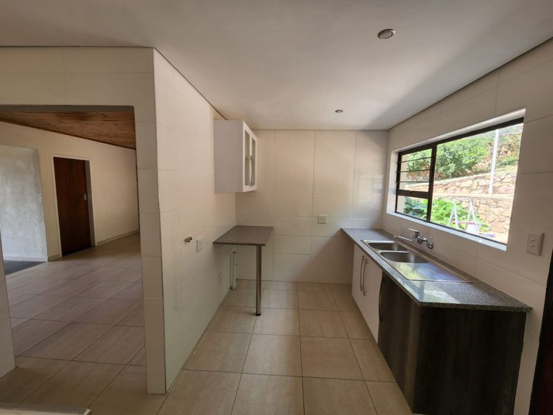 Spacious Family Home with Two Flatlets, Pool & Excellent Work-From-Home Potential - Photo 7