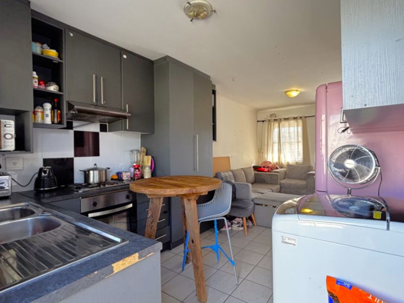 Move-In Ready 2-Bedroom Home with Secure Estate Access & Convenient Location - Photo 8