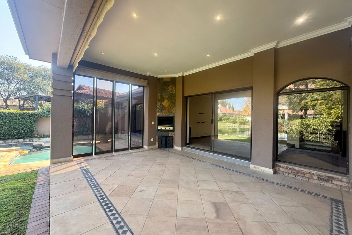 Elegant 4-Bedroom Home with Dam & Golf Course Views | Pecanwood Estate - Photo 5