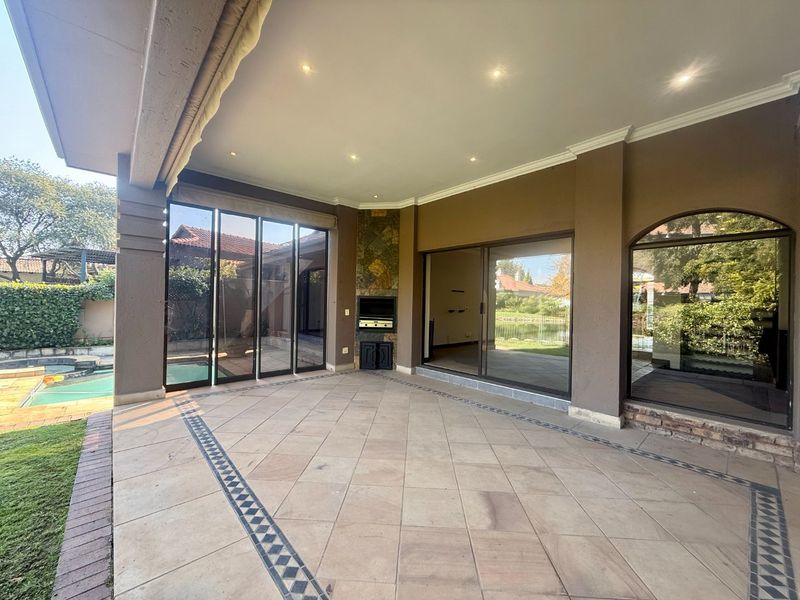 Elegant 4-Bedroom Home with Dam & Golf Course Views | Pecanwood Estate - Photo 5