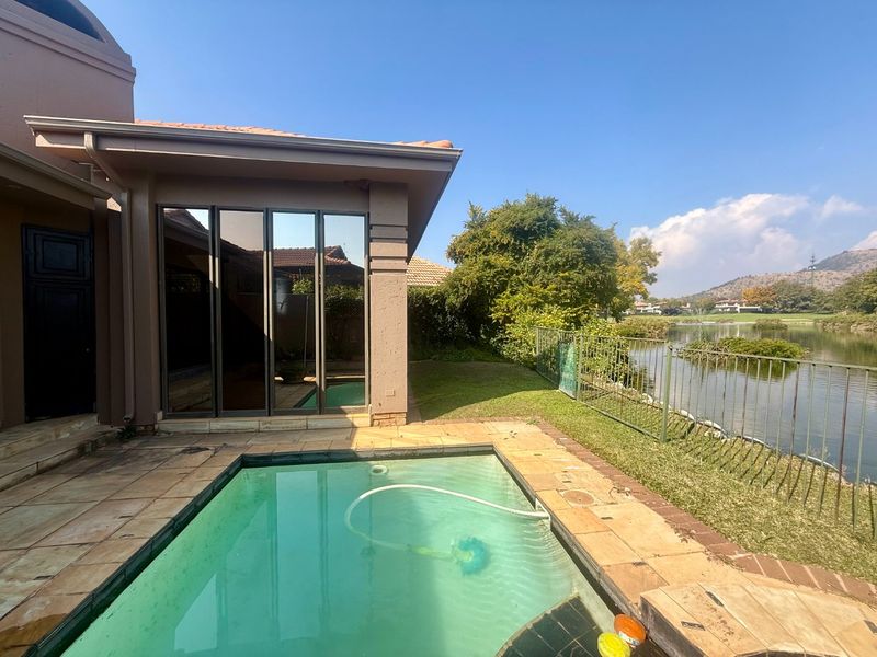 Elegant 4-Bedroom Home with Dam & Golf Course Views | Pecanwood Estate - Photo 7