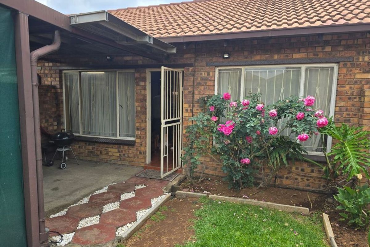 Cozy Two-Bedroom Home with Secure Garage - Photo 3