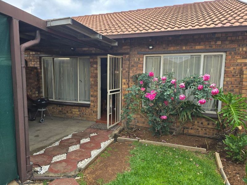 Cozy Two-Bedroom Home with Secure Garage - Photo 3