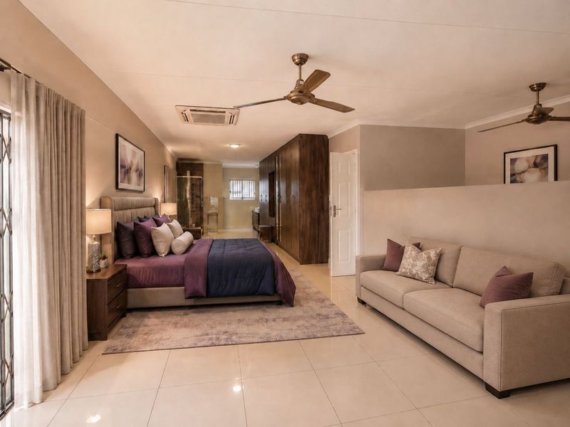 Spacious bedroom featuring tiled flooring, built-in cupboards, ceiling fans, and integrated air conditioning, with an open-plan layout and direct access to outdoor space.