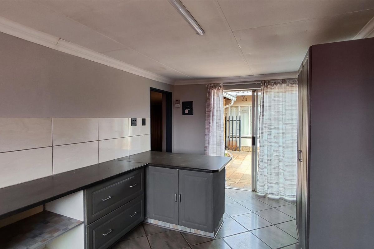 Spacious 4-Bedroom Family Home with an Income-Generating 2-Bedroom Flatlet in New State Areas! - Photo 2