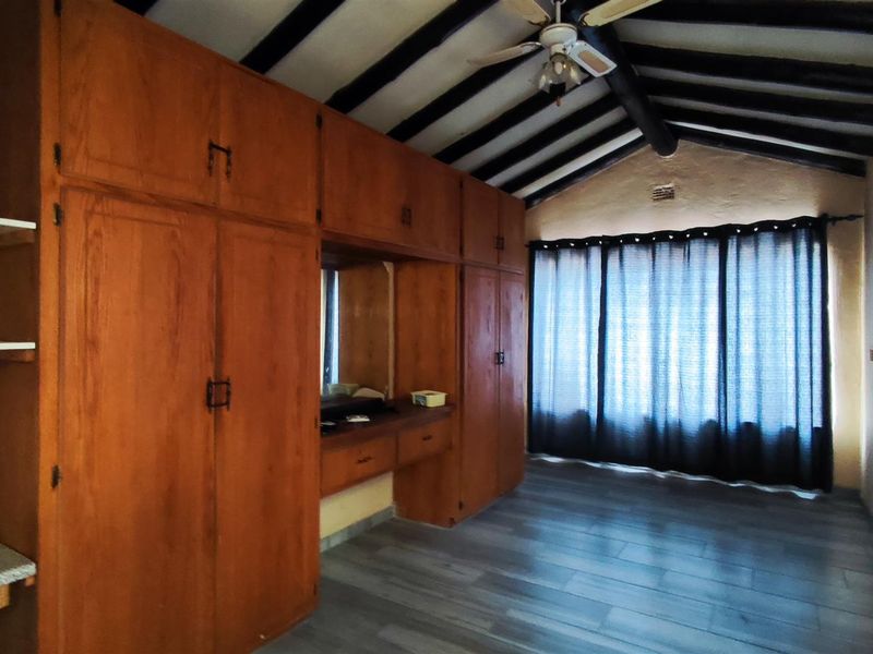 Spacious 4-Bedroom Family Home with an Income-Generating 2-Bedroom Flatlet in New State Areas! - Photo 9