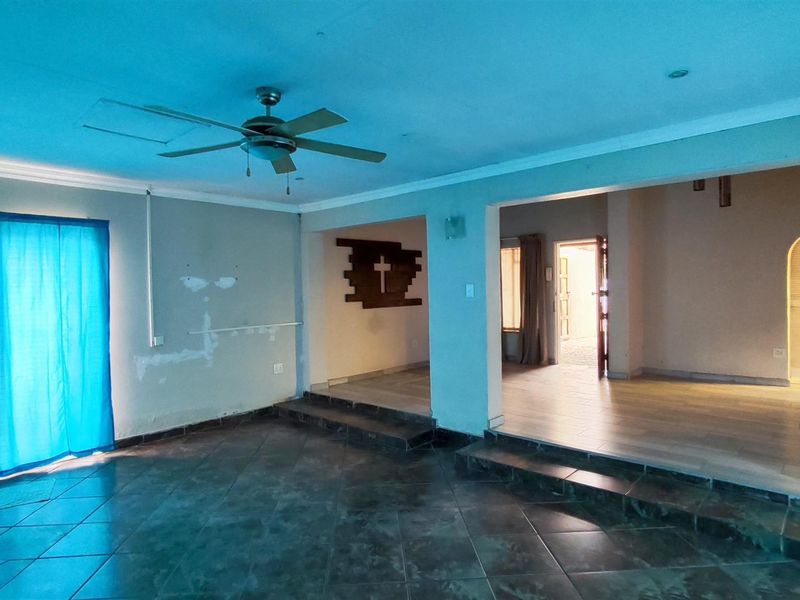 Spacious 4-Bedroom Family Home with an Income-Generating 2-Bedroom Flatlet in New State Areas! - Photo 7