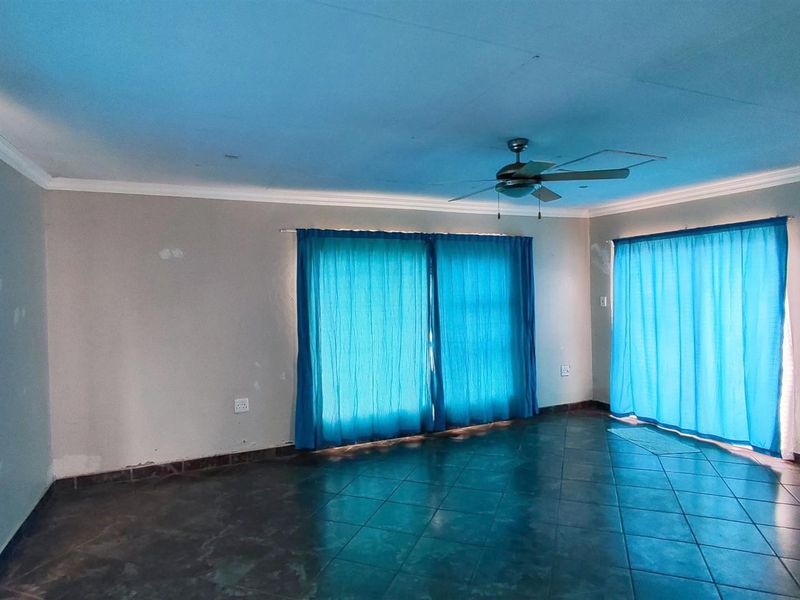 Spacious 4-Bedroom Family Home with an Income-Generating 2-Bedroom Flatlet in New State Areas! - Photo 6