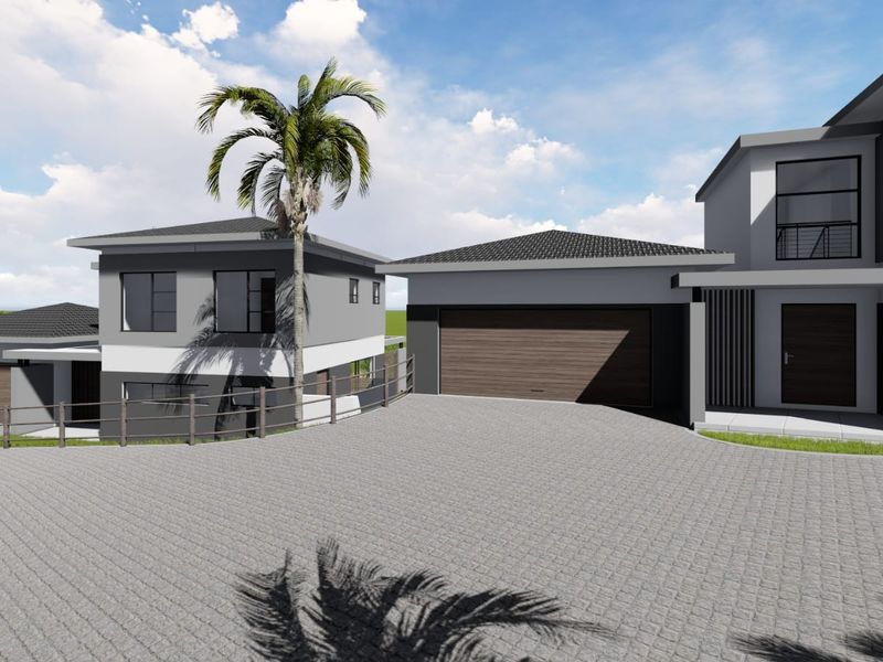Modern architectural exterior view of a double-story house featuring a paved driveway, double garage, and contemporary grey and white facade.