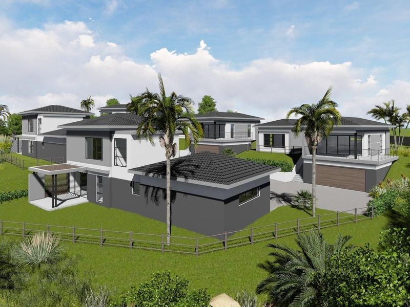 An aerial perspective of a modern residential development featuring multiple contemporary homes with tiled roofs, balconies, and integrated garages set in landscaped grounds.