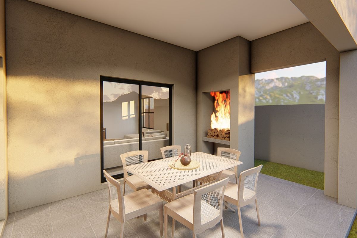 A covered outdoor patio featuring a built-in fireplace, tiled flooring, and direct access to the interior living space through sliding glass doors.