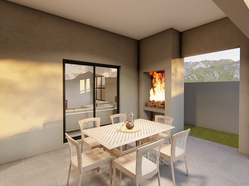 A covered outdoor patio featuring a built-in fireplace, tiled flooring, and direct access to the interior living space through sliding glass doors.