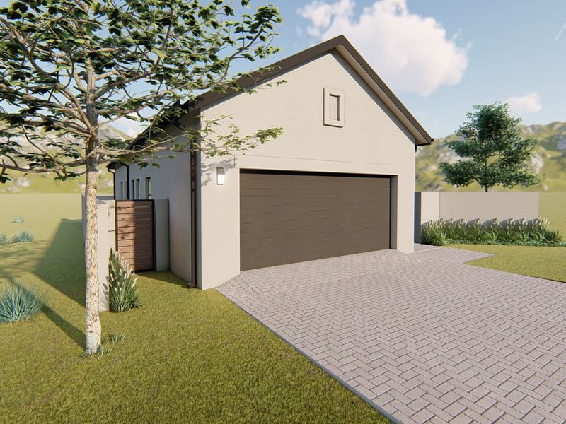 A modern residential garage exterior featuring a paved driveway, clean rendered facade, and secure boundary walling.