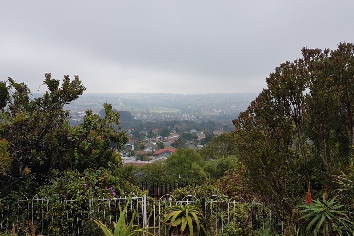 A Hillside Gem with Spectacular Views – Spacious, Charming & Ready to Welcome You Home! - Photo 4