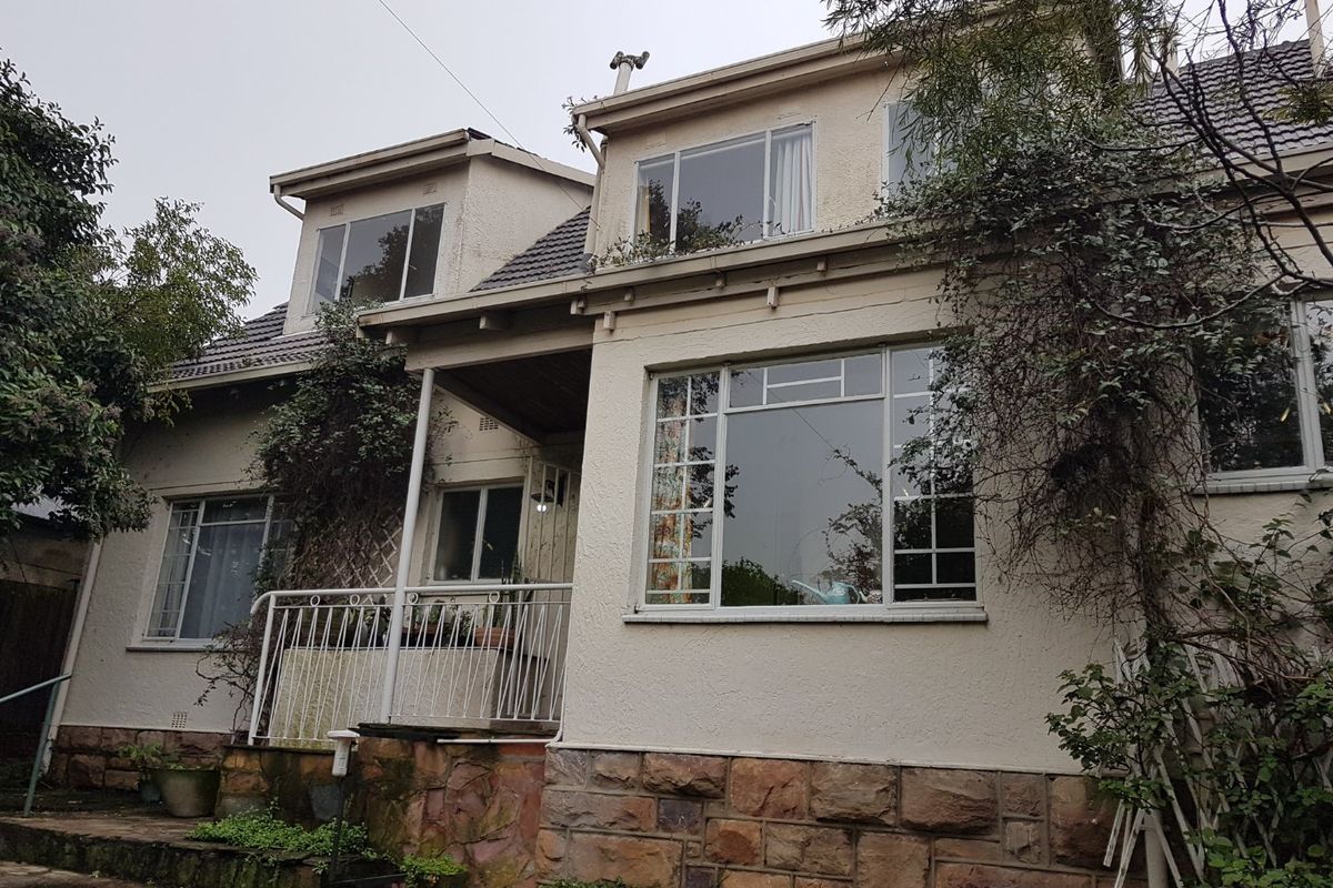 A Hillside Gem with Spectacular Views – Spacious, Charming & Ready to Welcome You Home! - Photo 2