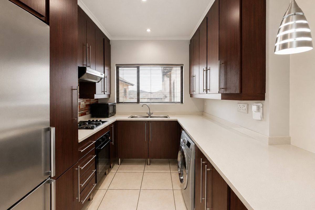 Greenstone Hill Gem with Open Plan Living and balcony with built in Braai. - Photo 5