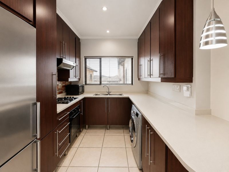 Greenstone Hill Gem with Open Plan Living and balcony with built in Braai. - Photo 5