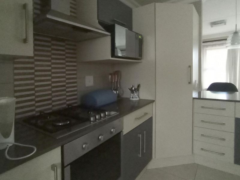 Charming Double-Storey Townhouse with Private Garden in Secure Riverbend Estate, Kyalami Hills - Photo 3