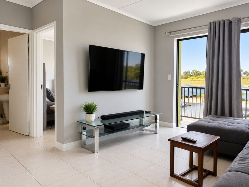 MODERN 1-BEDROOM APARTMENT WITH EXCELLENT INVESTMENT POTENTIAL IN GREENCREEK LIFESTYLE ESTATE - Photo 1