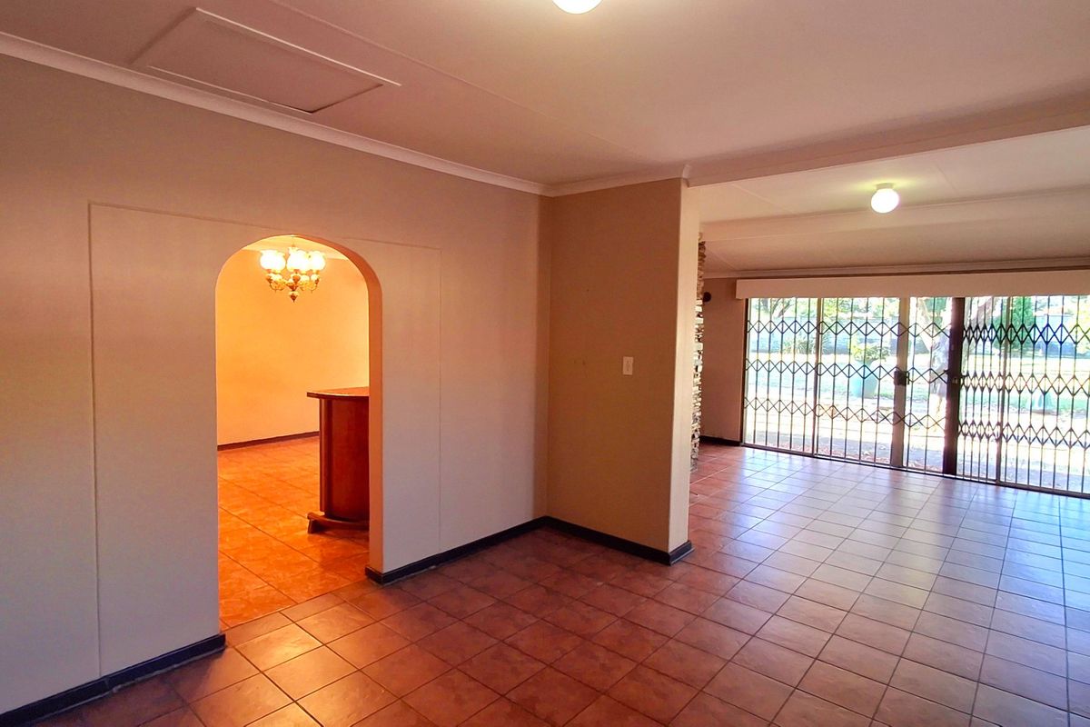Spacious 4-Bedroom Family Home with 3 Living Areas & Huge Yard in Prime Sasolburg Location - Photo 5