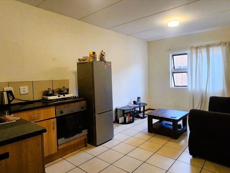 Cozy Two-Bedroom Home with Garage - Photo 2