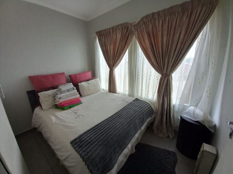 Neat Two-Bedroom Home with Comfortable Living Areas - Photo 3
