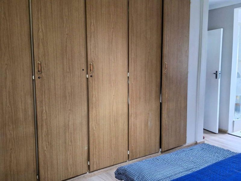 Spacious 5-Bedroom Family Home with Endless Potential - Photo 9