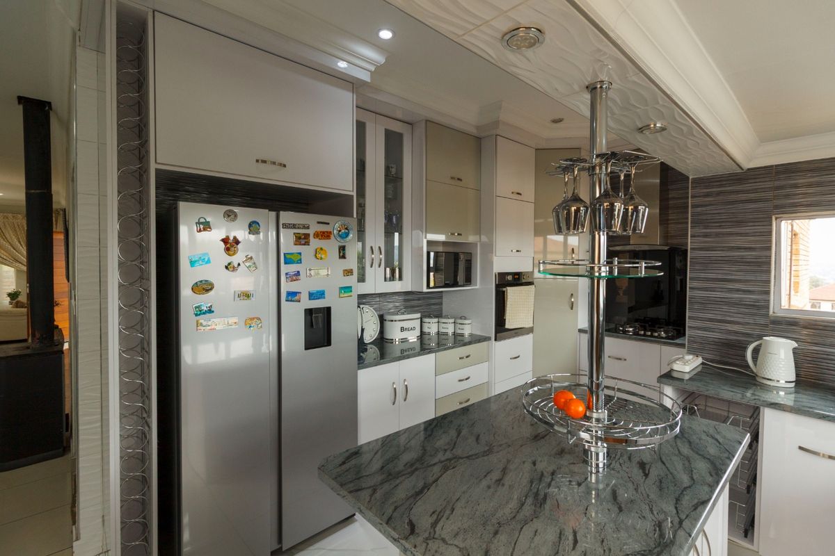 Elegant Family Living with Breathtaking Views in Rangeview - Photo 3