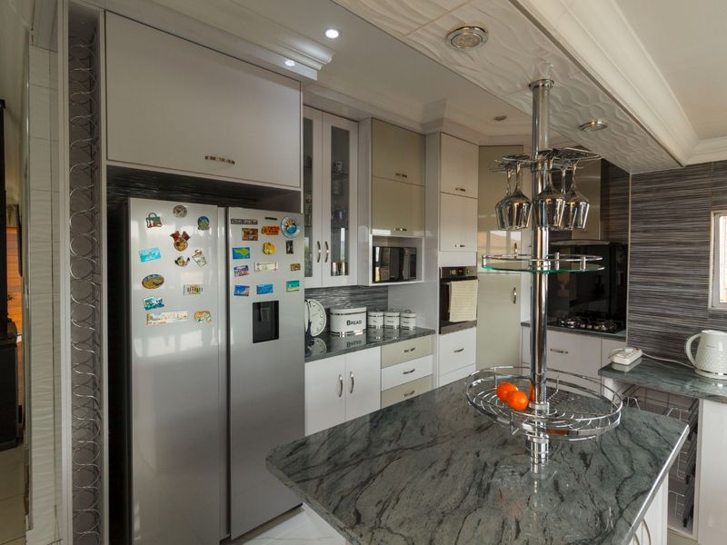 Elegant Family Living with Breathtaking Views in Rangeview - Photo 3