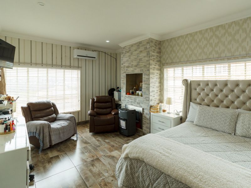 Elegant Family Living with Breathtaking Views in Rangeview - Photo 10